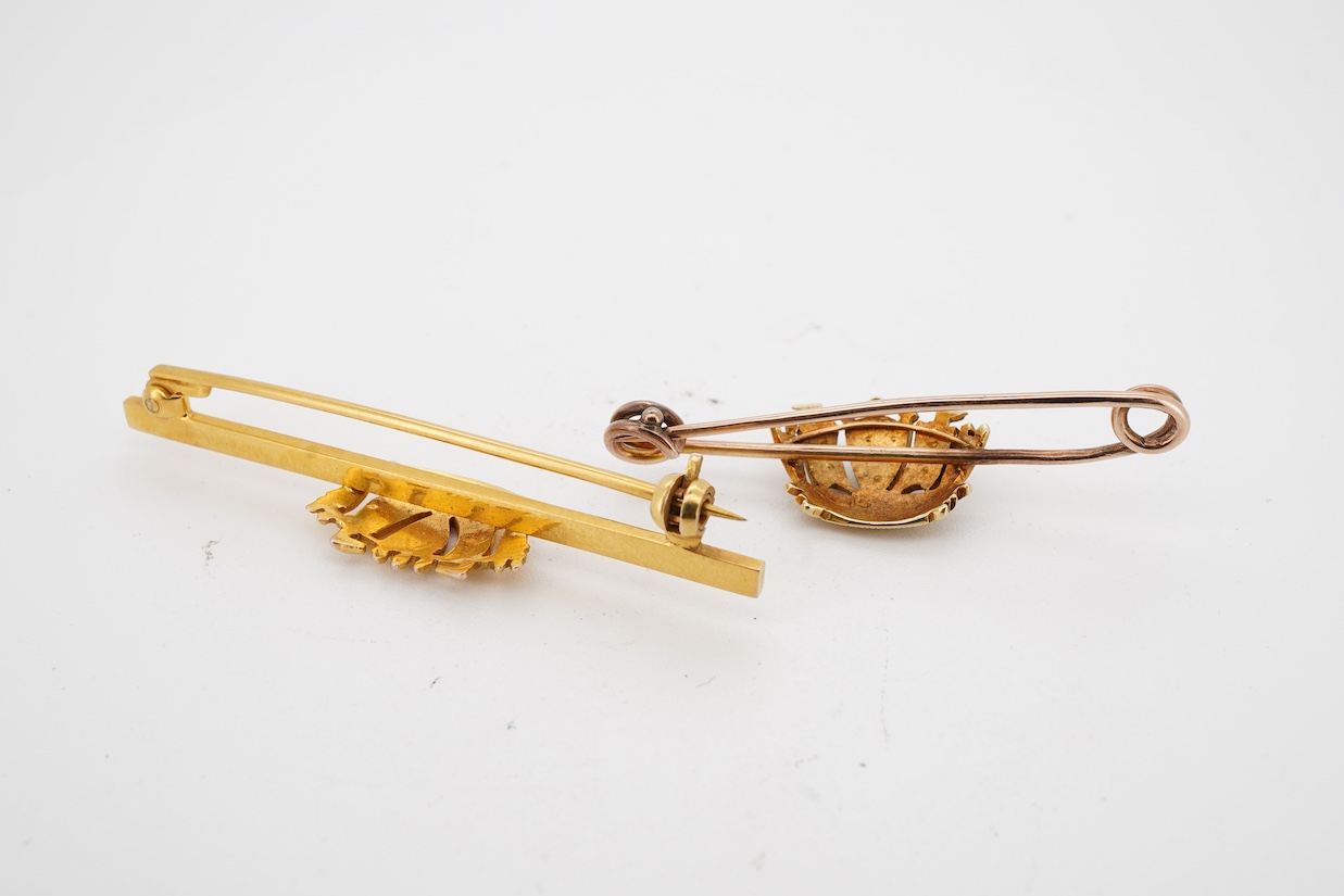 An Edwardian 15ct and seed pearl cluster set coronet bar brooch, 36mm, gross 2.4 grams and 9ct gold coronet bar brooch, 3.5 grams.